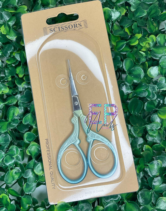 Blue and green straight scissors