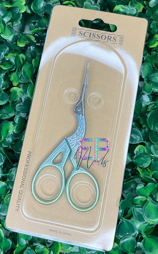 Blue and green scissors